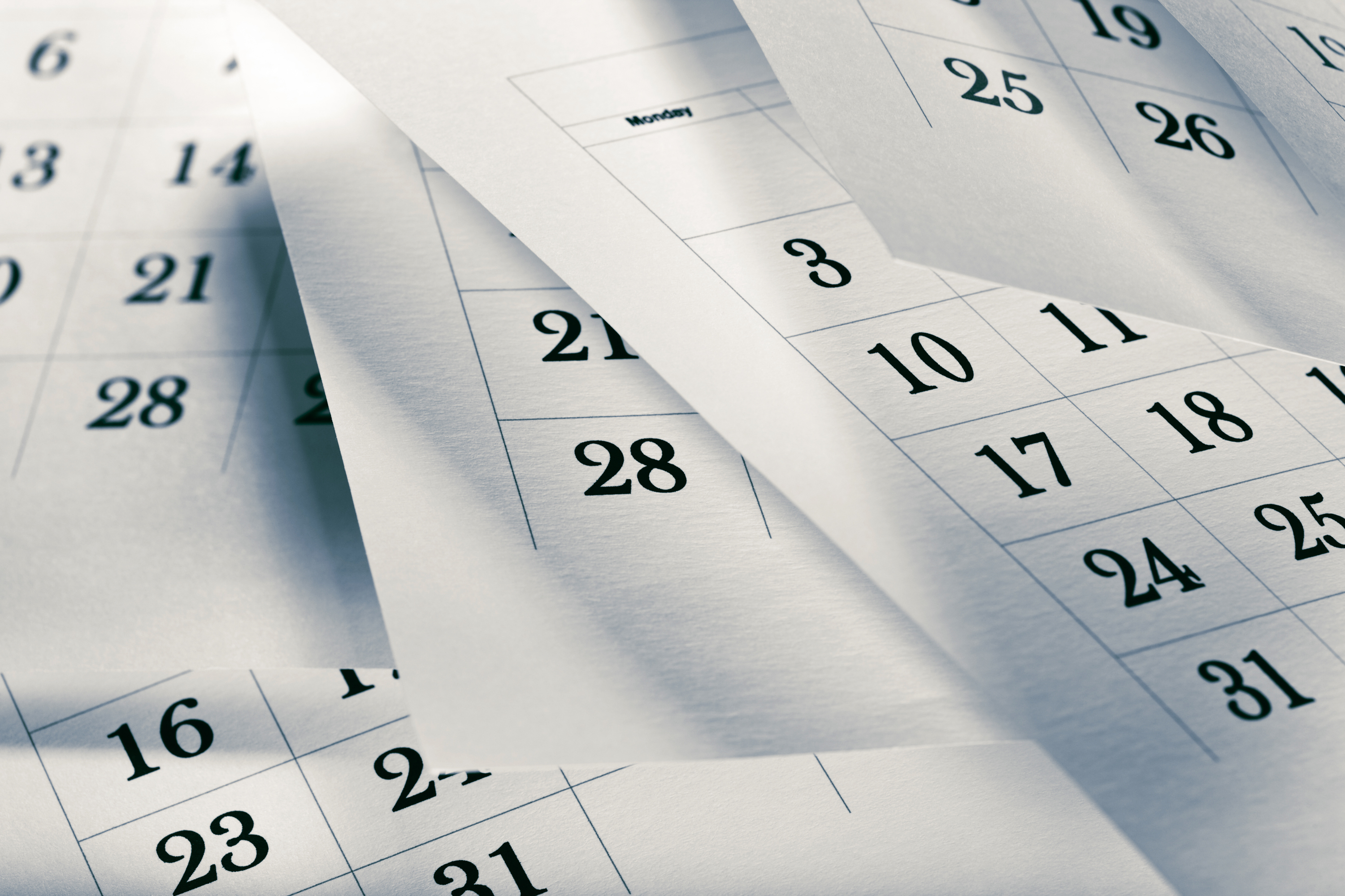 Several loose calendar sheets